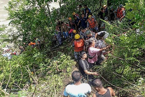 Bus falls into river in Nepal